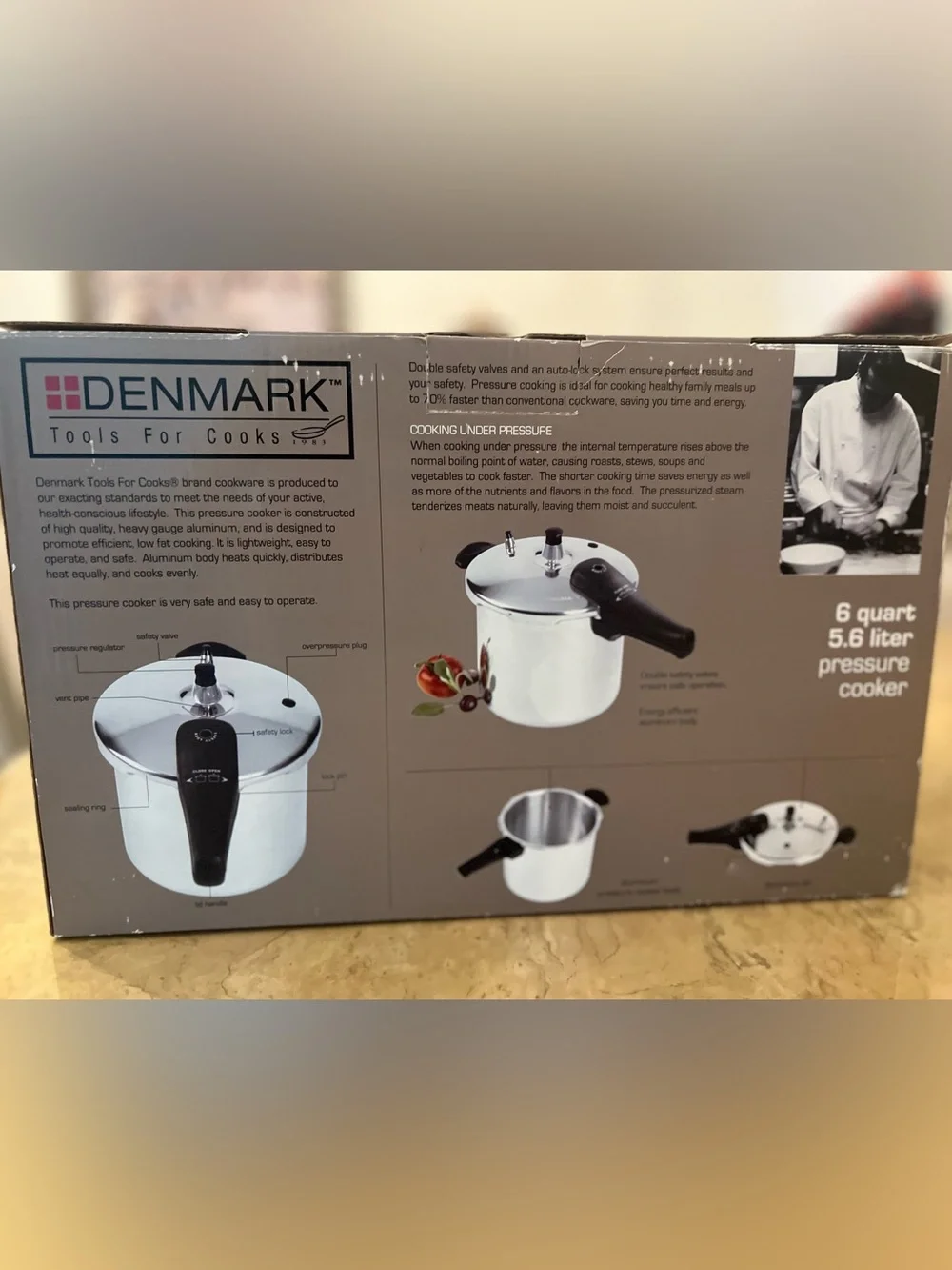 New - 6 Quart Stainless Steel Pressure Cooker with Black Handles
